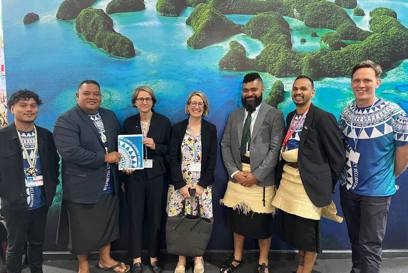 Dr Damian Spruce And Kioa Declaration Leaders Presenting Twin Clouds Report To New Australian Ambassador For Climate Change, Kristin Tilley. Photo Caritas Australia