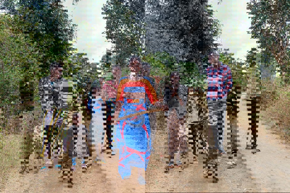 Memory Walking With Her Family On Their Farm