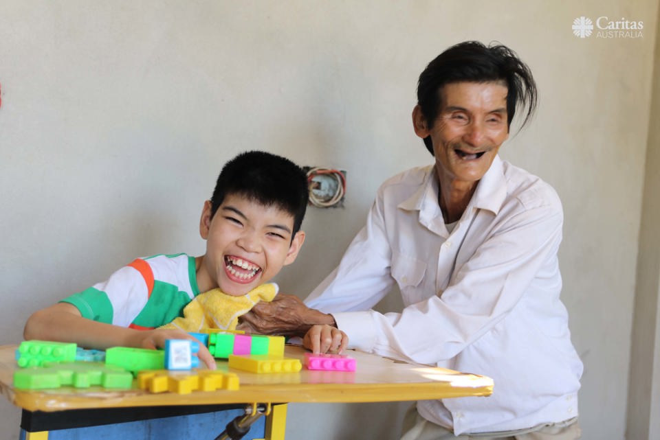 Ban Helps Support His Grandson Luc So That He Can Attend Home Based Classes