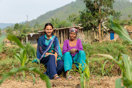 Laxmi And Mankala working in a field