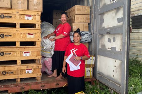 Caritas Tonga staff pre-positioning supplies