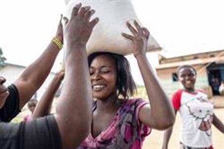 Anita 19 Collects Food From Caritas In The Ebola Hit Town Of Mambasa Drc Promesse's Family Has Been Short Of Money And Food Since The Epidemic Hit Local Markets