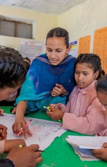 Laxmi With Younger Students