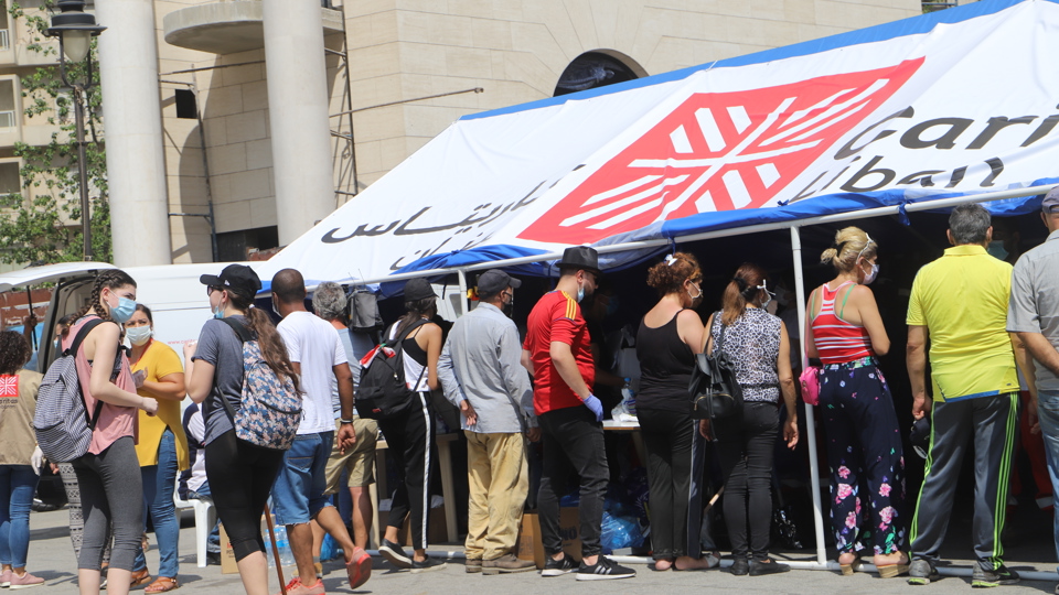 People queuing in Beirut after blast.