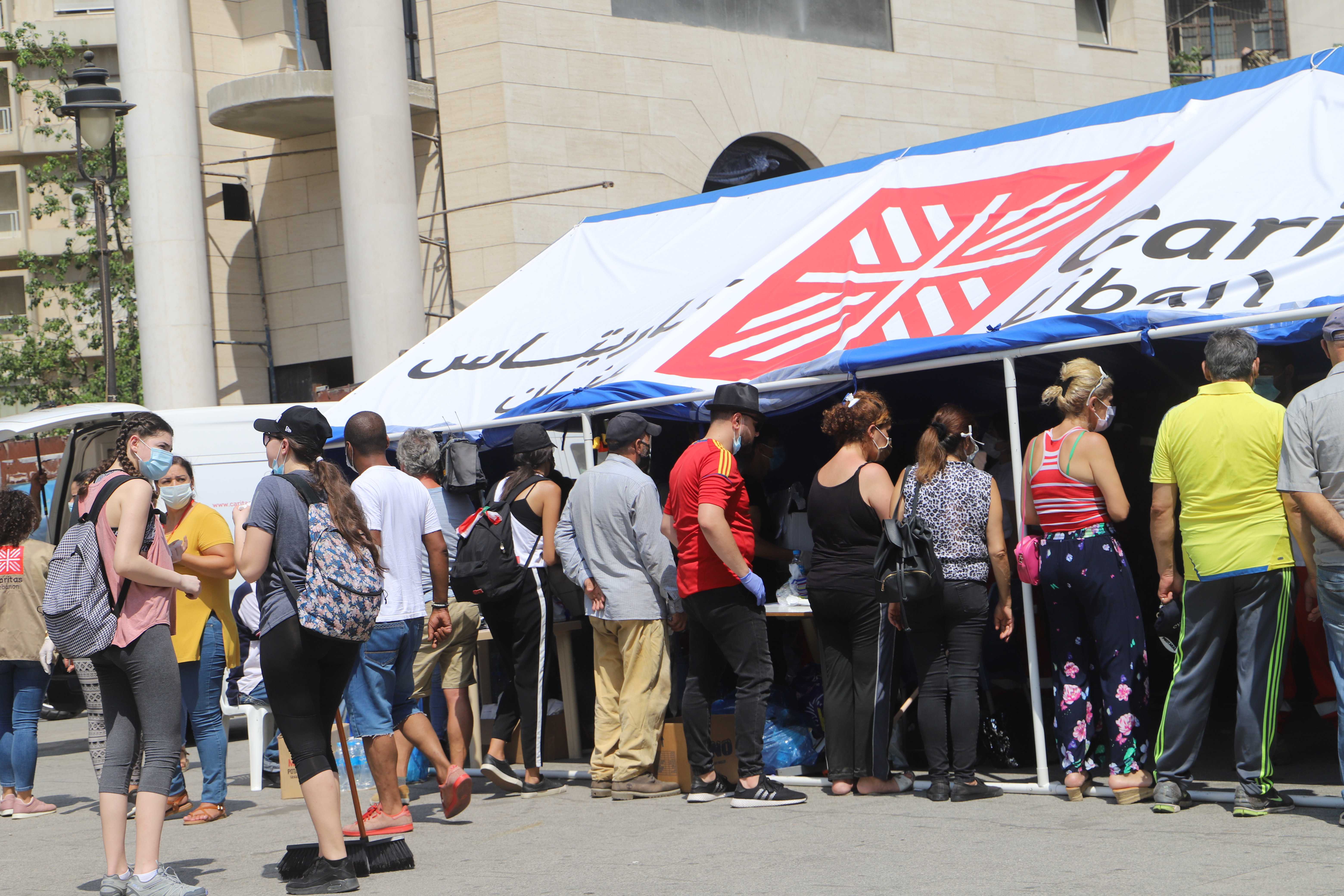 People queuing in Beirut after blast.