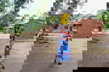Memory Carrying A Water Bucket