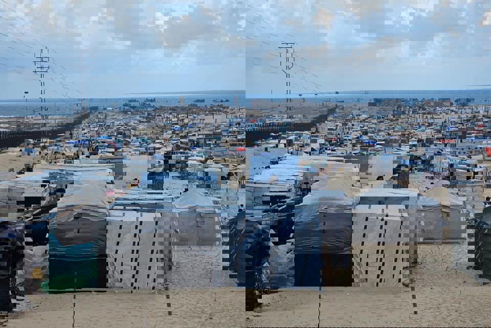 Temporary Shelters Housing People Displaced By Conflict In Gaza Photo Credit CRS