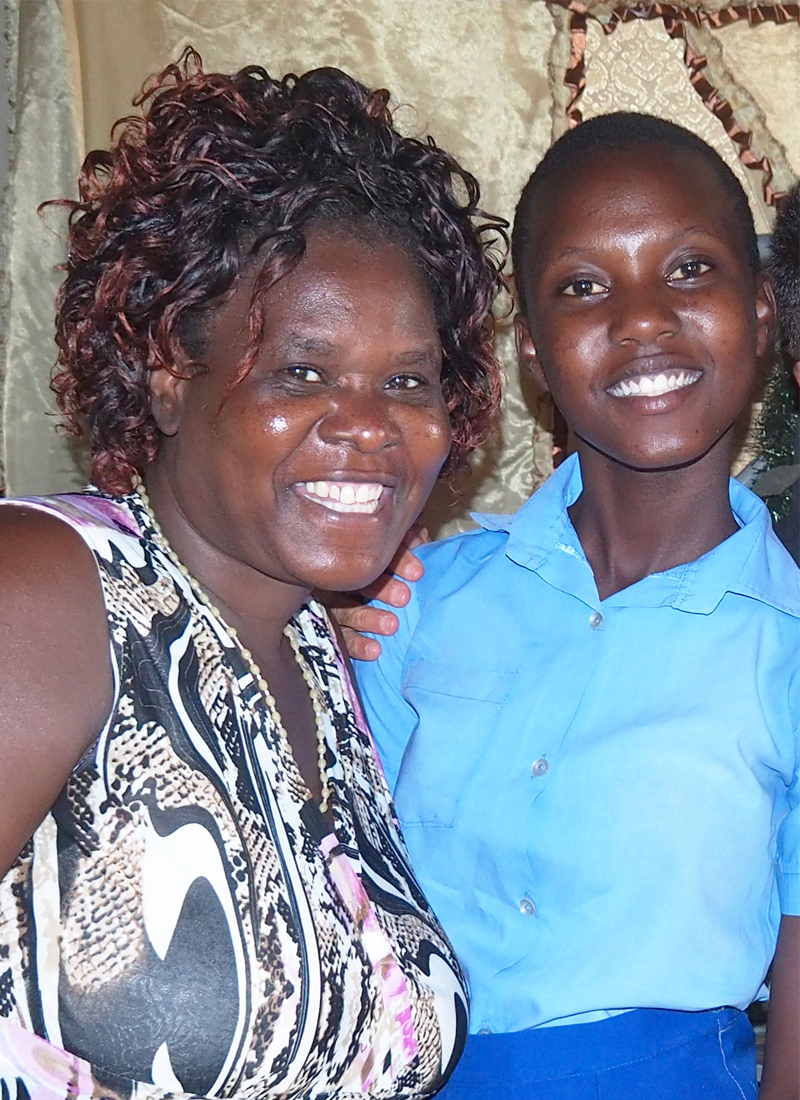 Thandolwayo with her aunt in their home in Zimbabwe (2)