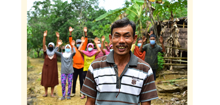 Arsad with his neighbours in Pandeglang District, Indonesia