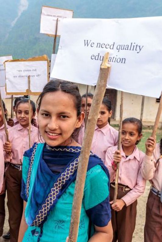 Laxmi With Placard