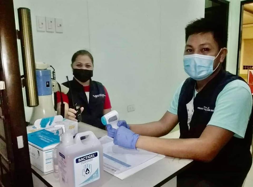 Staff at Palo's multi purpose office building supporting evacuees during Typhoon Rai. Photo: Caritas Palo